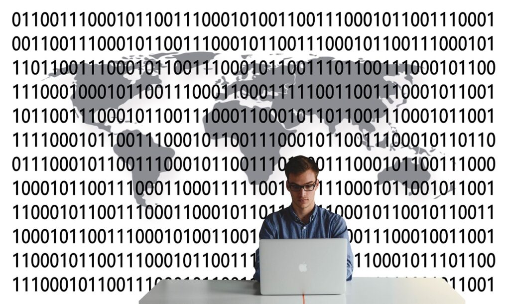 man working and binary codes shown